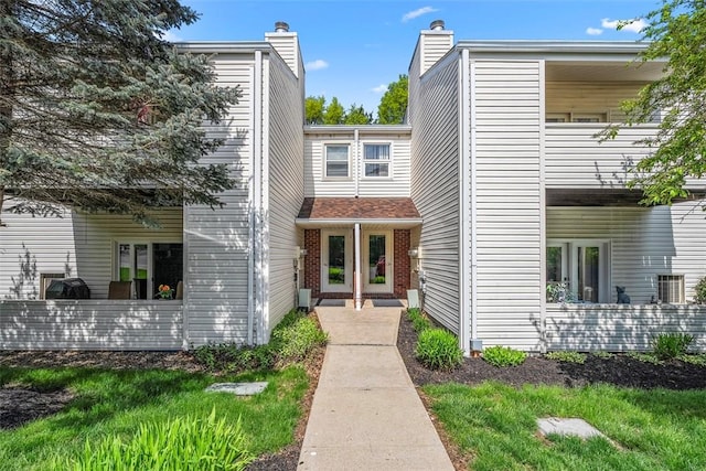 1406 Kenzie Dr, Robinson Twp Nwa, PA 15205 - view of front of house featuring a chimney