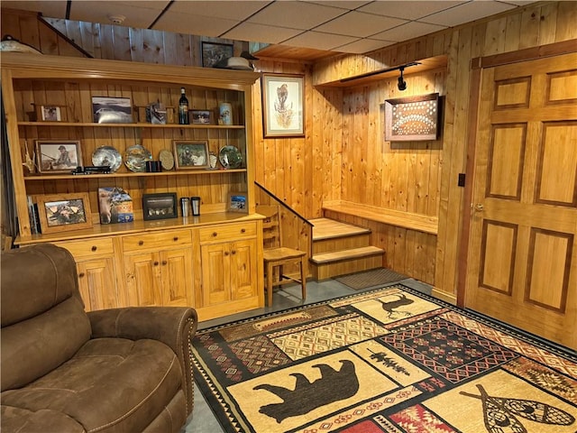 111 Mccall Rd, Franklin Twp But, PA 16001 - living area featuring wooden walls and stairs