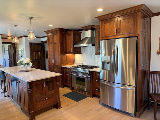 111 Mccall Rd, Franklin Twp But, PA 16001 - kitchen with appliances with stainless steel finishes, wall chimney exhaust hood, light wood-style floors, tasteful backsplash, and recessed lighting