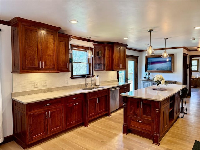 111 Mccall Rd, Franklin Twp But, PA 16001 - kitchen featuring a sink, stainless steel dishwasher, healthy amount of natural light, crown molding, and decorative backsplash