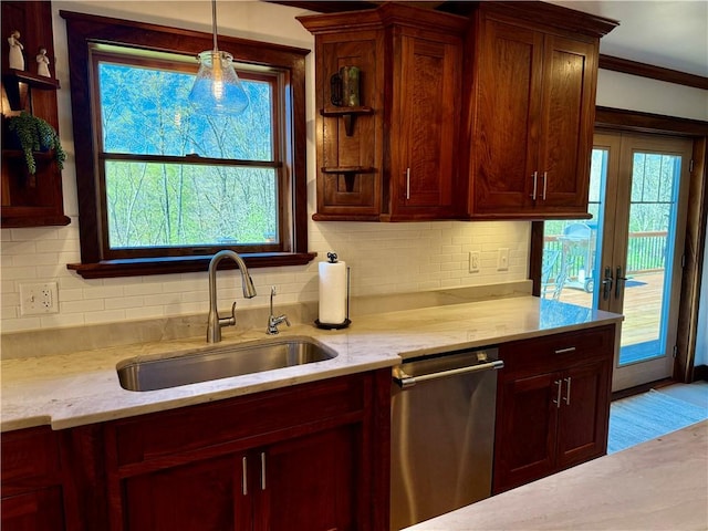 111 Mccall Rd, Franklin Twp But, PA 16001 - kitchen with a sink, dishwasher, backsplash, decorative light fixtures, and crown molding