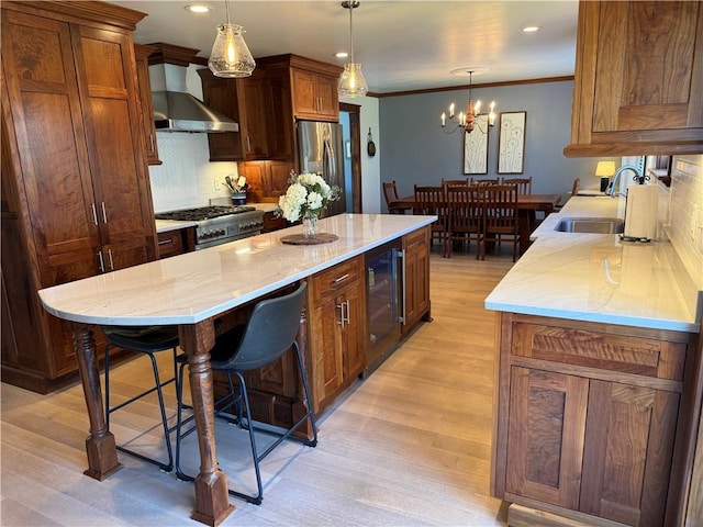 111 Mccall Rd, Franklin Twp But, PA 16001 - kitchen with wall chimney exhaust hood, a sink, stainless steel fridge, range with gas stovetop, and decorative backsplash