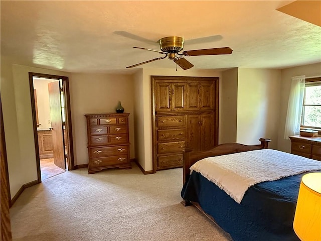 111 Mccall Rd, Franklin Twp But, PA 16001 - bedroom featuring light colored carpet, baseboards, ensuite bathroom, and a ceiling fan