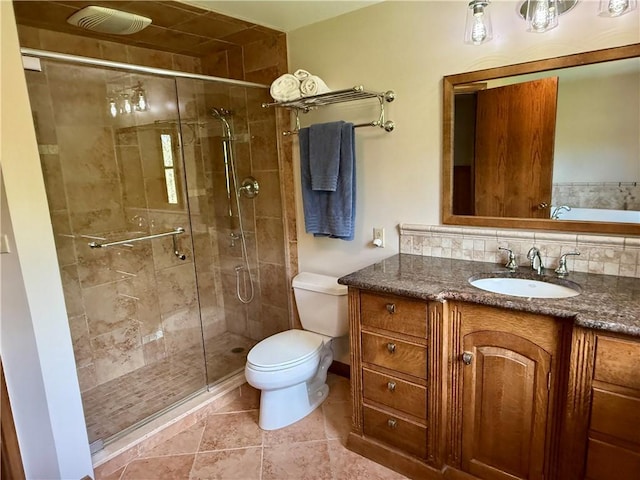111 Mccall Rd, Franklin Twp But, PA 16001 - full bathroom with toilet, a stall shower, vanity, and tasteful backsplash