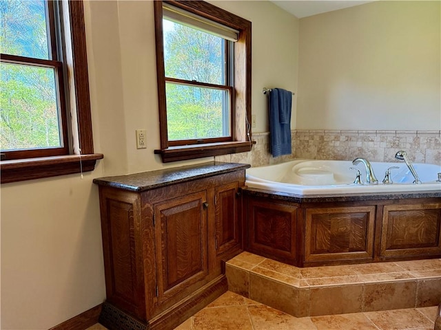 111 Mccall Rd, Franklin Twp But, PA 16001 - bathroom featuring a bath and tile patterned floors
