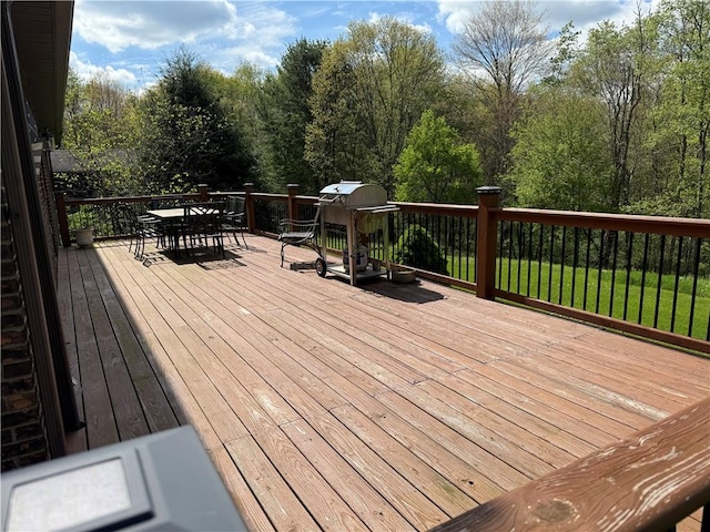 111 Mccall Rd, Franklin Twp But, PA 16001 - wooden deck featuring outdoor dining area and a grill