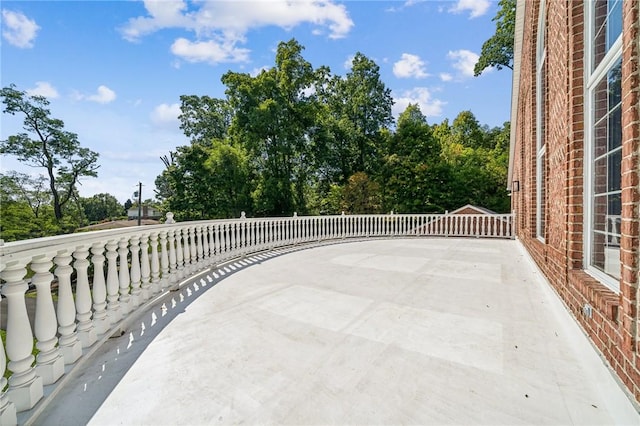 view of patio featuring view of scattered trees