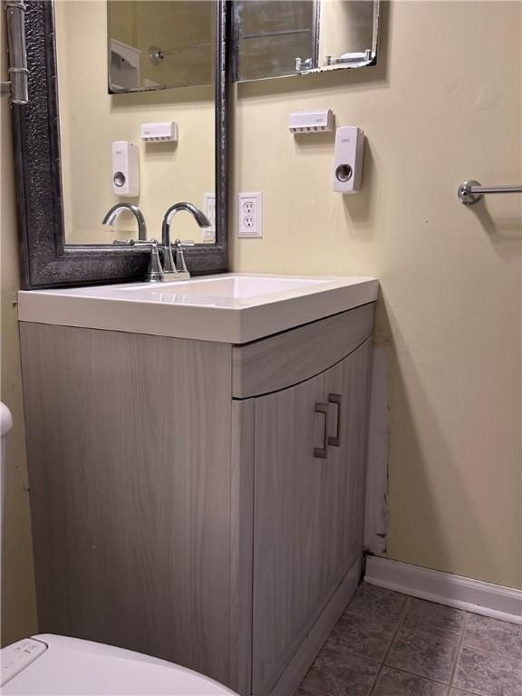 491 Peregrine Dr, North Huntingdon, PA 15642 - bathroom featuring baseboards and vanity