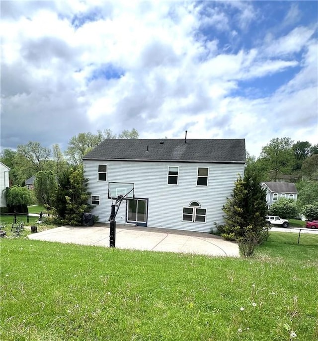 491 Peregrine Dr, North Huntingdon, PA 15642 - back of property featuring a patio and a lawn