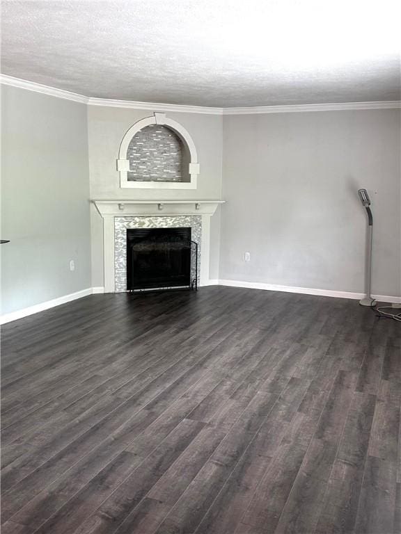 491 Peregrine Dr, North Huntingdon, PA 15642 - unfurnished living room featuring a tiled fireplace, dark wood-style floors, baseboards, a textured ceiling, and ornamental molding