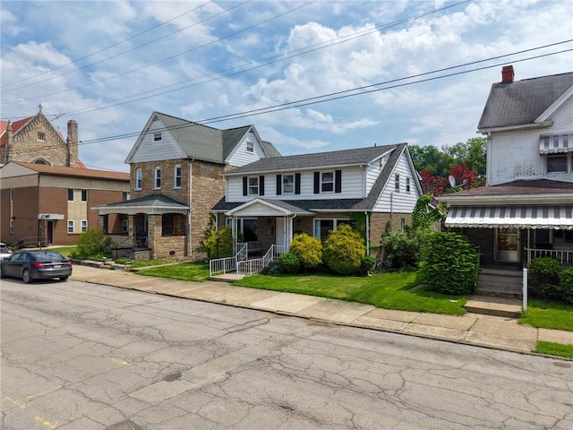 710 4th Ave, Ford City Boro, PA 16226 - view of front of home featuring brick siding and a front yard
