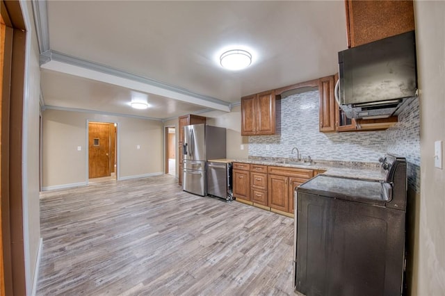 710 4th Ave, Ford City Boro, PA 16226 - kitchen with appliances with stainless steel finishes, light wood-type flooring, a sink, tasteful backsplash, and baseboards