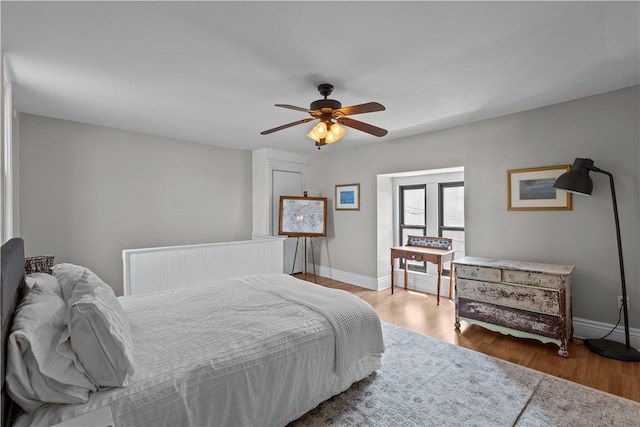 2611 Jane St, South Side, PA 15203 - bedroom featuring baseboards, wood finished floors, and ceiling fan