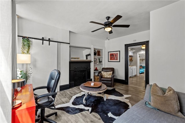 2611 Jane St, South Side, PA 15203 - office area with ceiling fan, wood finished floors, and baseboards