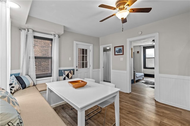 2611 Jane St, South Side, PA 15203 - dining space featuring wainscoting, a ceiling fan, and wood finished floors