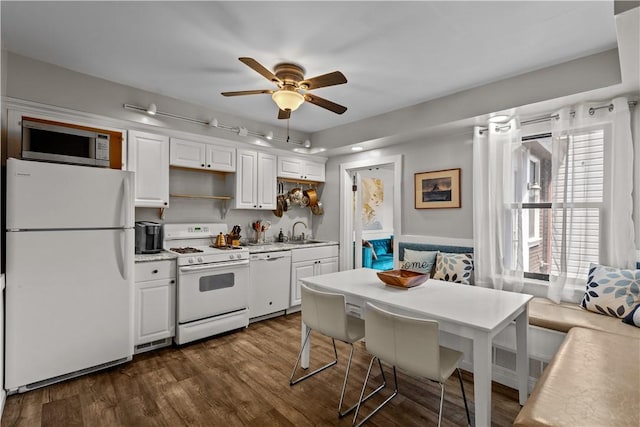 2611 Jane St, South Side, PA 15203 - kitchen featuring white appliances, white cabinetry, light countertops, a ceiling fan, and dark wood-type flooring