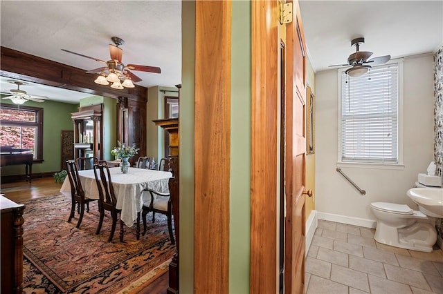 209 Bon Air Ave, Bon Air, PA 15210 - bathroom featuring a ceiling fan, baseboards, and plenty of natural light