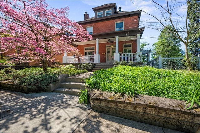 209 Bon Air Ave, Bon Air, PA 15210 - traditional style home with a porch, brick siding, and a ceiling fan