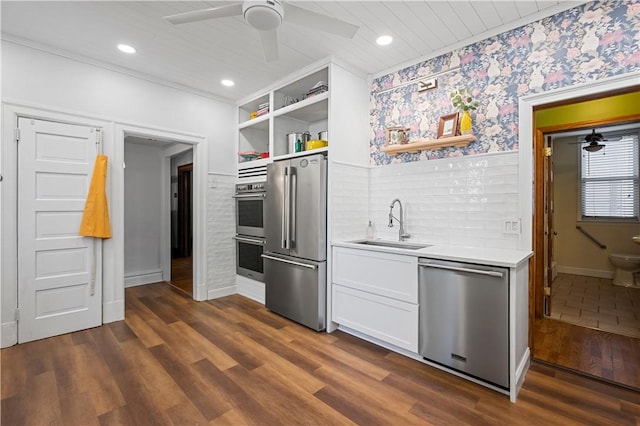 209 Bon Air Ave, Bon Air, PA 15210 - kitchen with stainless steel appliances, a sink, a ceiling fan, open shelves, and wallpapered walls