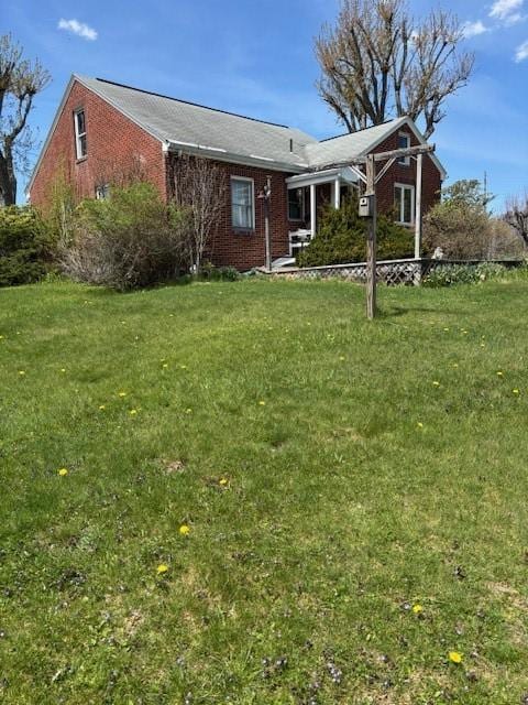 438 Fayette Springs Rd, Wharton Twp, PA 15421 - view of front of house with a front lawn and brick siding