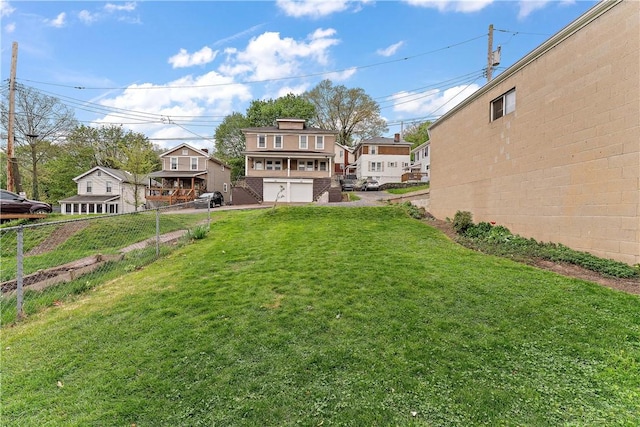 view of yard featuring a garage