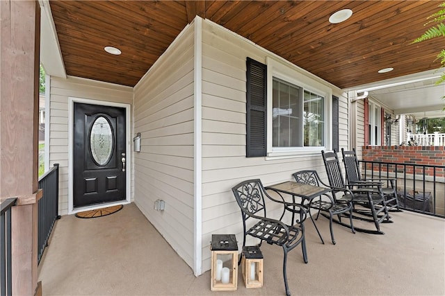 property entrance featuring covered porch