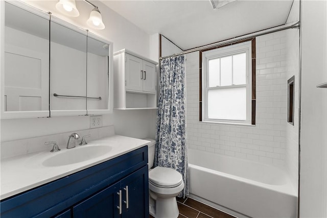 bathroom featuring toilet, vanity, and shower / bath combination with curtain