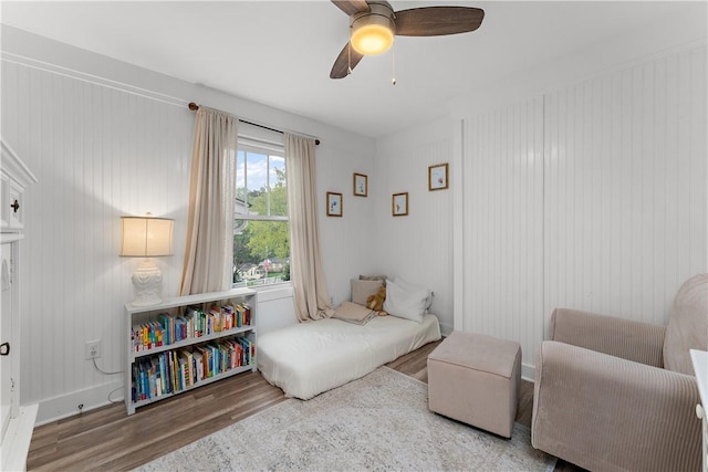 bedroom with wood finished floors and ceiling fan