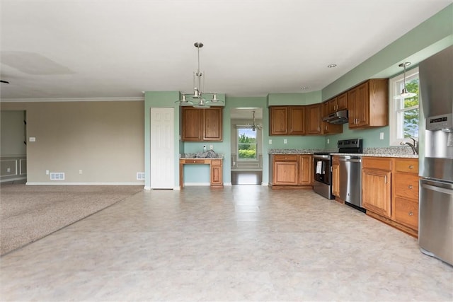 921 Bideford Dr, South Park, PA 15129 - kitchen with range, under cabinet range hood, stainless steel refrigerator with ice dispenser, healthy amount of natural light, and crown molding