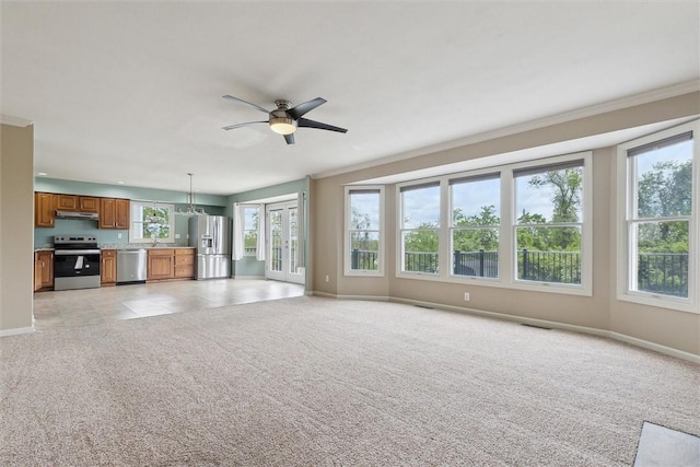 921 Bideford Dr, South Park, PA 15129 - unfurnished living room featuring baseboards, ceiling fan, crown molding, light colored carpet, and a sink