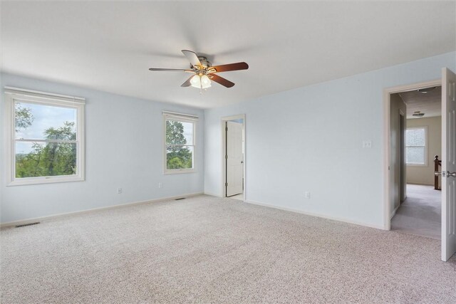 921 Bideford Dr, South Park, PA 15129 - unfurnished room with light colored carpet, ceiling fan, and plenty of natural light