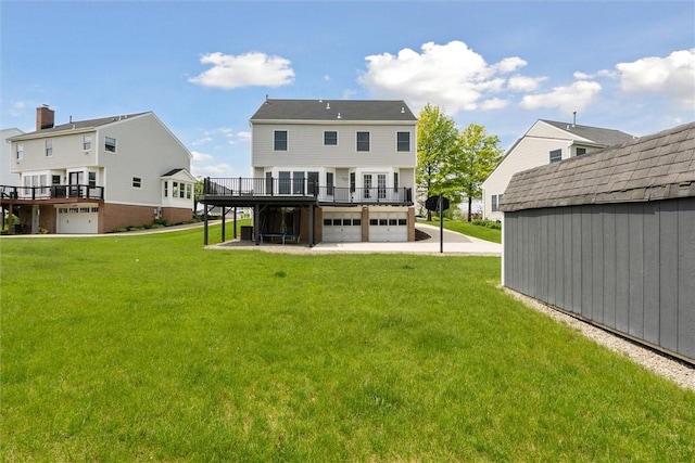 921 Bideford Dr, South Park, PA 15129 - back of house featuring a deck, a garage, a yard, and a storage shed
