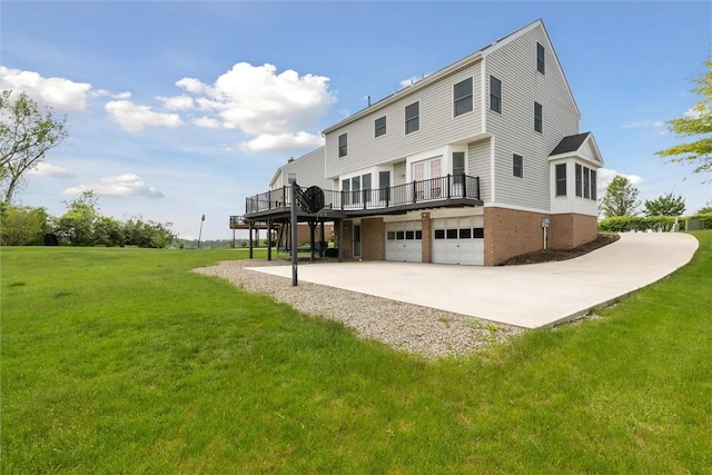 921 Bideford Dr, South Park, PA 15129 - rear view of house with a wooden deck, a yard, a garage, and concrete driveway