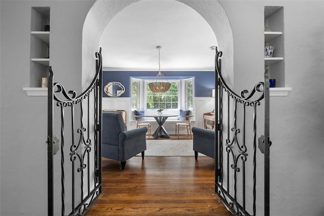 401 Parker Dr, Mt Lebanon, PA 15216 - foyer entrance featuring arched walkways, dark wood finished floors, and stairway