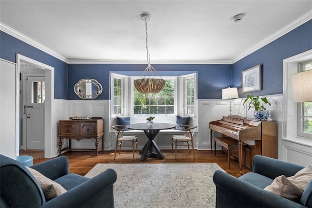 401 Parker Dr, Mt Lebanon, PA 15216 - sitting room featuring wood finished floors, ornamental molding, a chandelier, wainscoting, and a decorative wall