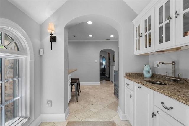 401 Parker Dr, Mt Lebanon, PA 15216 - indoor wet bar featuring arched walkways, lofted ceiling, baseboards, recessed lighting, and light tile patterned floors