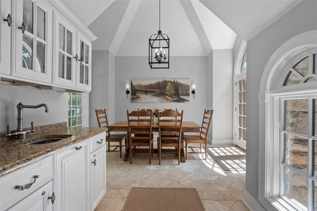 401 Parker Dr, Mt Lebanon, PA 15216 - dining room featuring a chandelier, bar with sink, and high vaulted ceiling