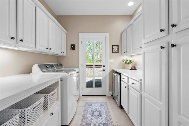 149 Walnut Ridge Dr, Chippewa Twp, PA 15010 - laundry area featuring washing machine and dryer, cabinet space, light tile patterned floors, and wine cooler