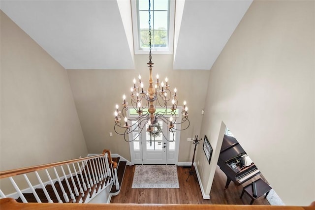 149 Walnut Ridge Dr, Chippewa Twp, PA 15010 - foyer entrance with wood finished floors, a chandelier, lofted ceiling, and baseboards