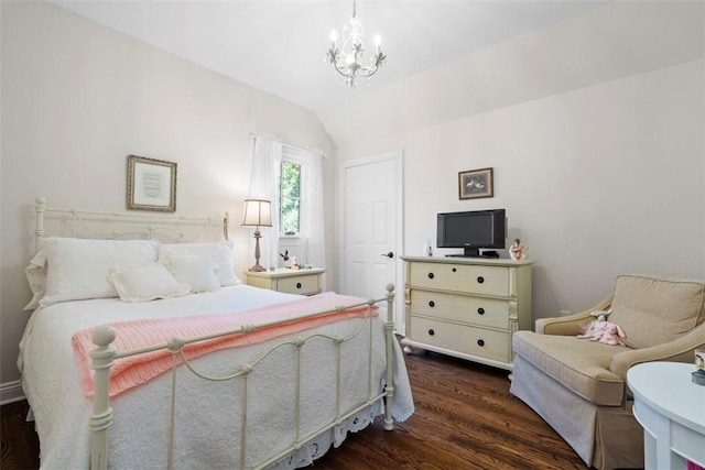 149 Walnut Ridge Dr, Chippewa Twp, PA 15010 - bedroom with a chandelier, dark wood finished floors, and lofted ceiling
