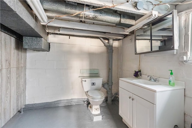134 Modisette Ave, Donora, PA 15033 - half bath featuring toilet, vanity, concrete floors, and concrete block wall