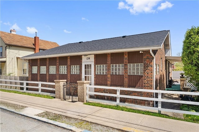 134 Modisette Ave, Donora, PA 15033 - view of front of property featuring roof with shingles and a fenced front yard