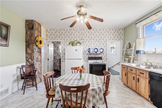 134 Modisette Ave, Donora, PA 15033 - dining area featuring light marble finish floors and a ceiling fan