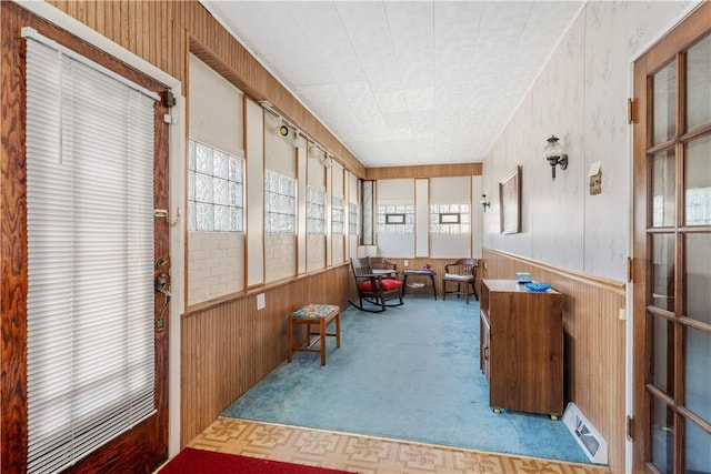 134 Modisette Ave, Donora, PA 15033 - sunroom / solarium with carpet floors, wood walls, a wainscoted wall, and outdoor lounge area