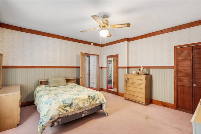 134 Modisette Ave, Donora, PA 15033 - carpeted bedroom with a ceiling fan, a closet, wallpapered walls, and baseboards