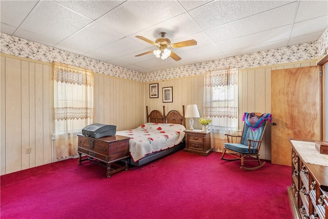 134 Modisette Ave, Donora, PA 15033 - bedroom with carpet, wallpapered walls, ceiling fan, a paneled ceiling, and wooden walls