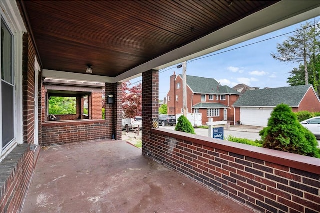 1008 Lowery St, Duquesne, PA 15110 - view of patio featuring covered porch and a residential view