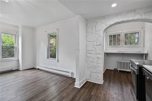 1008 Lowery St, Duquesne, PA 15110 - unfurnished dining area featuring radiator, a baseboard heating unit, dark wood finished floors, healthy amount of natural light, and ornamental molding