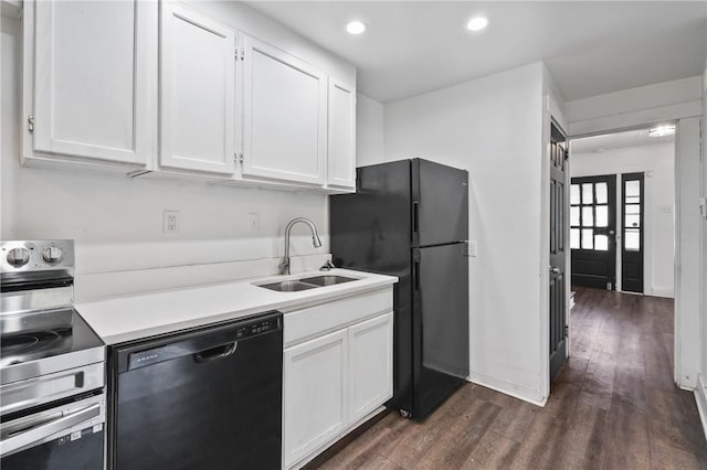 1008 Lowery St, Duquesne, PA 15110 - kitchen with black appliances, a sink, white cabinets, dark wood finished floors, and light countertops