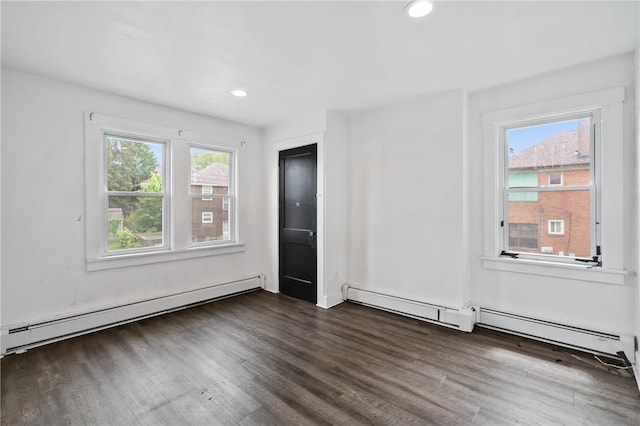 1008 Lowery St, Duquesne, PA 15110 - spare room with baseboard heating, dark wood finished floors, and recessed lighting